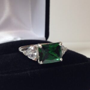 5.5ct Side Set Emerald Cut Emerald Ring Trillion White Sapphire Accents With Sizing 5.5ct Side Set Emerald Cut Emerald Ring Trillion White Sapphire Accents With Sizing