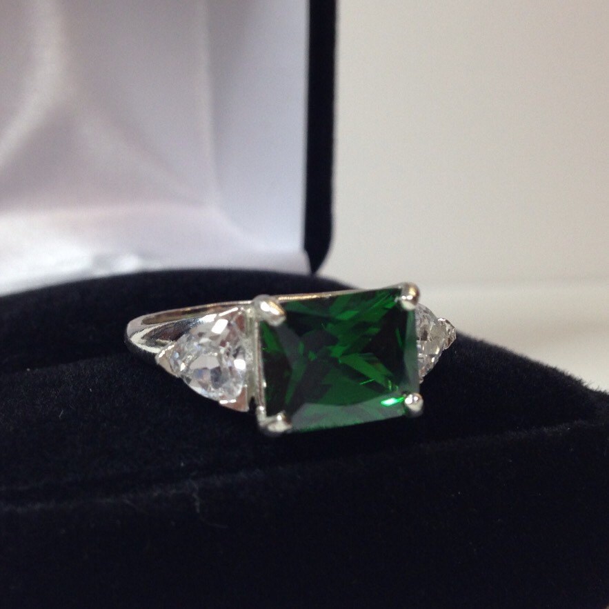 5.5ct Side Set Emerald Cut Emerald Ring Trillion White Sapphire Accents With Sizing