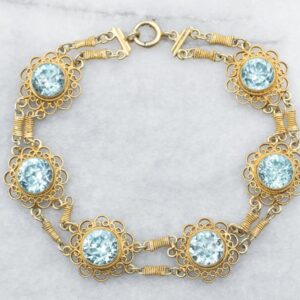 14k Yellow Gold Blue Zircon Filigree Bracelet, 7 Inches 14k Yellow Gold Blue Zircon Filigree Bracelet, 7 Inches
