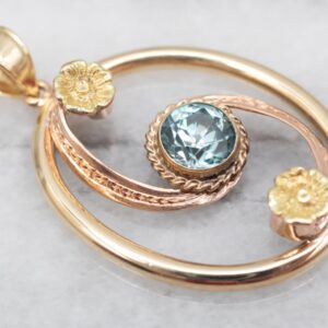 10K Yellow & Rose Gold Blue Zircon Floral Swirl Pendant