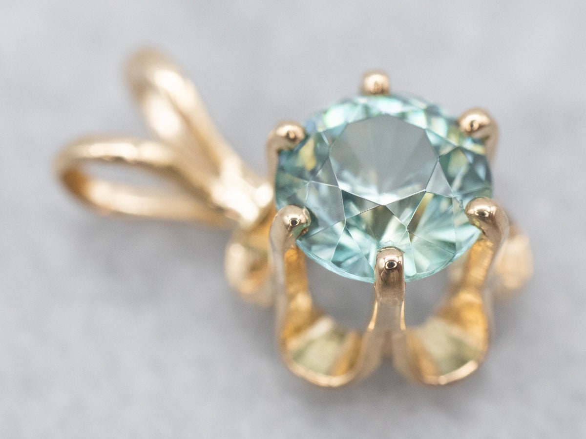 14k Gold Blue Zircon Buttercup Pendant, December Birthstone