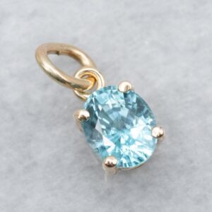 14K Yellow Gold Blue Zircon Oval Solitaire Pendant