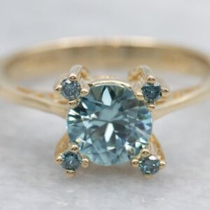 14k Yellow Gold Blue Zircon Ring With Blue Diamonds 14k Yellow Gold Blue Zircon Ring With Blue Diamonds