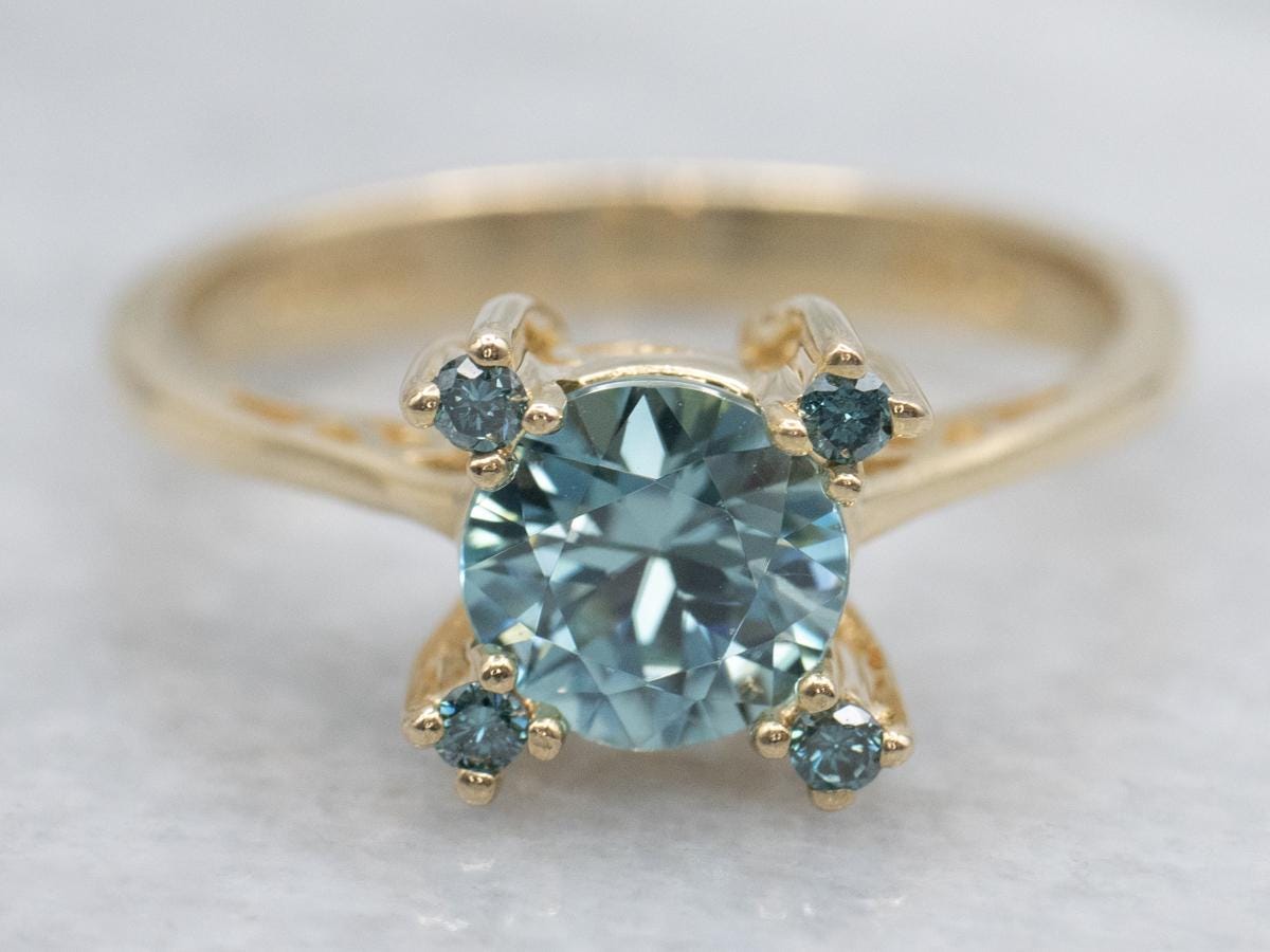 14k Yellow Gold Blue Zircon Ring With Blue Diamonds