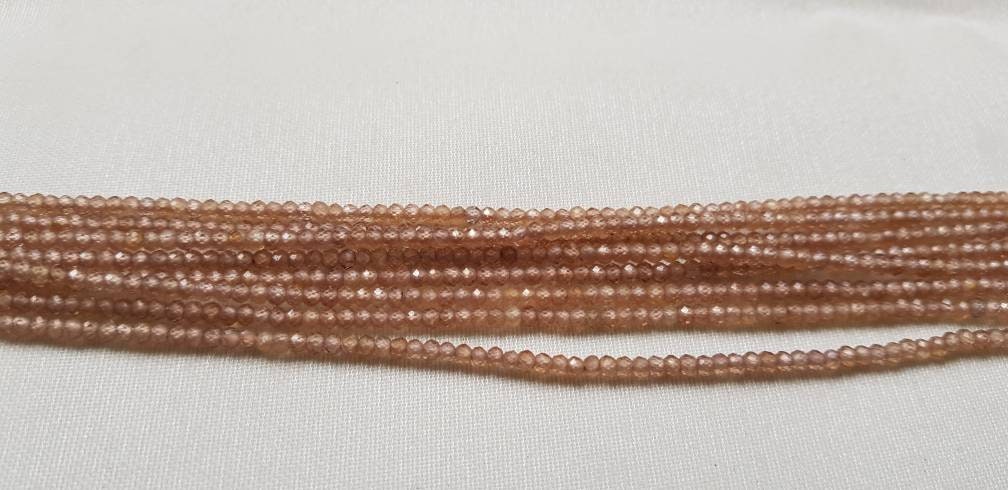 Bead Natural Brown Zircon 3mm Round Fact 12.50" Each.